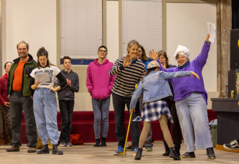 Volunteers practice their skits before EmberFest