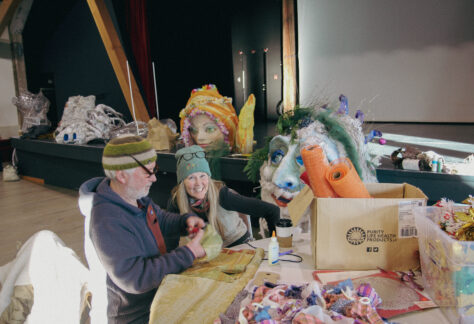 Artist, Kathryn Cooke, volunteers her time at the Playhouse Workshops